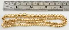 Sparkling Tapered Gold Bead Necklace