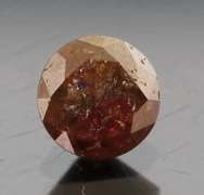 Eye catching 1.25ct round cut earth tones Diamond solitaire