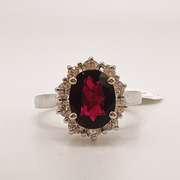 Stunning 14kt Gold, Pink Tourmaline, & Diamond Halo Ring