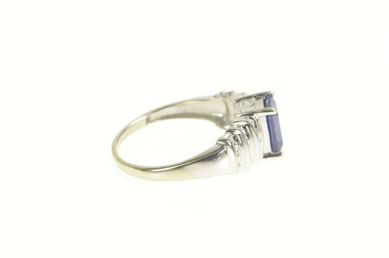 10K White Gold Emerald Cut Syn. Sapphire Diamond Accent Ring