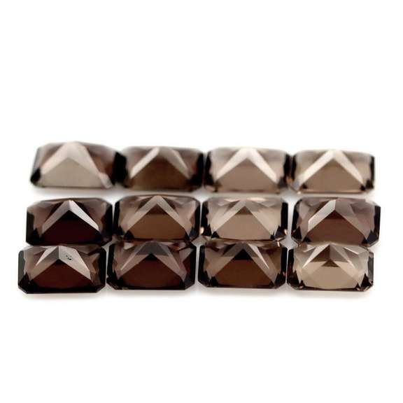 Emerald cut! Unheated! 15.67ct Smoky Quartz set
