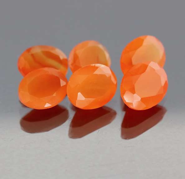 Vivid orange 13.06ct untreated oval cut Carnelian set
