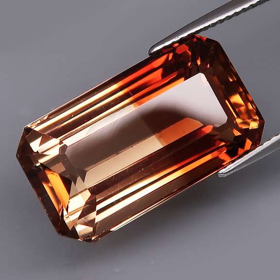 Collectors 24.79ct bi-color Imperial Topaz