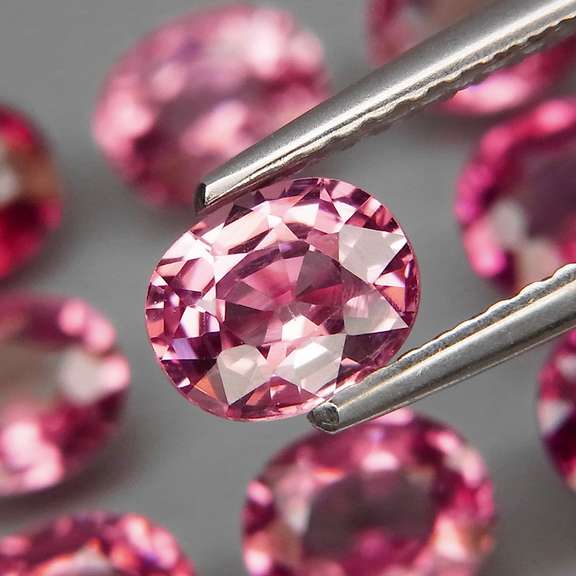 Remarkable 6.48ct violet pink Rhodolite Garnet set