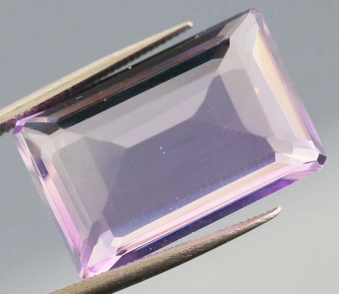 Shimmering violet 11.88ct emerald cut Amethyst