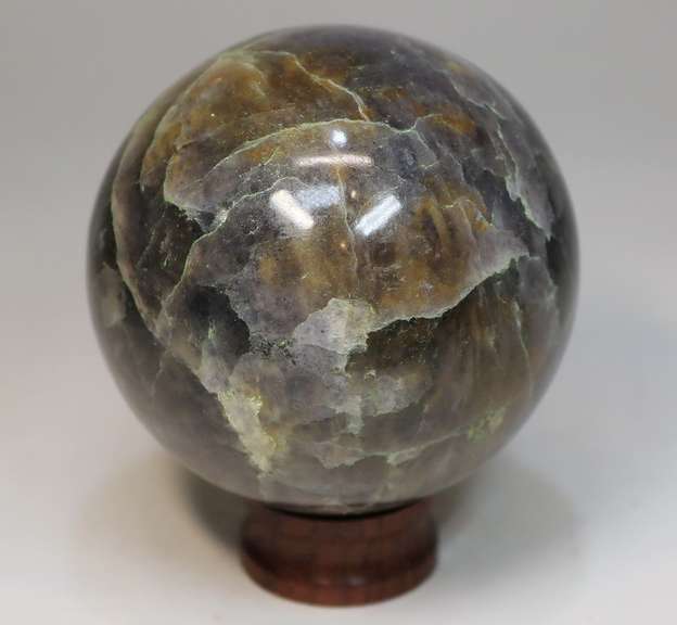 Amazing color! 1,776ct  galaxy patterned Iolite sphere