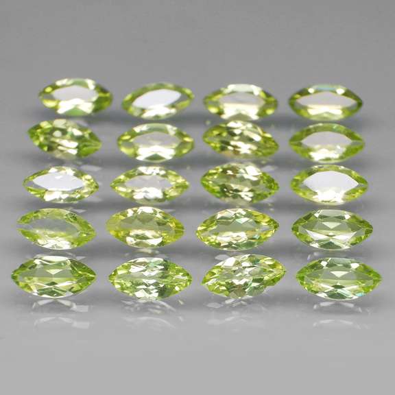 Dazzling 7.85ct untreated apple green Peridot set