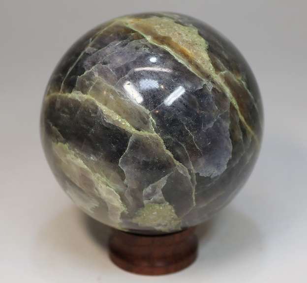 Amazing color! 1,776ct  galaxy patterned Iolite sphere