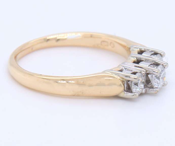 Brilliant Yellow Gold Three Stone Diamond Band