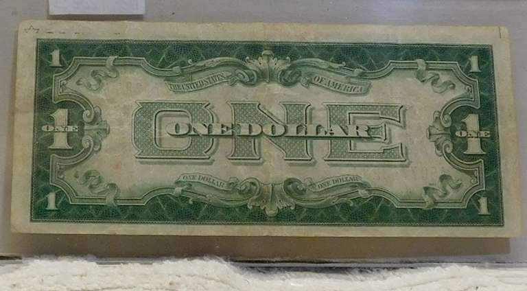 1934 $1. Sil Cert, almost Unc, 1 year type