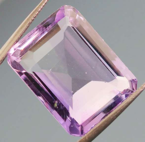 Bright violet 10.39ct emerald cut Amethyst