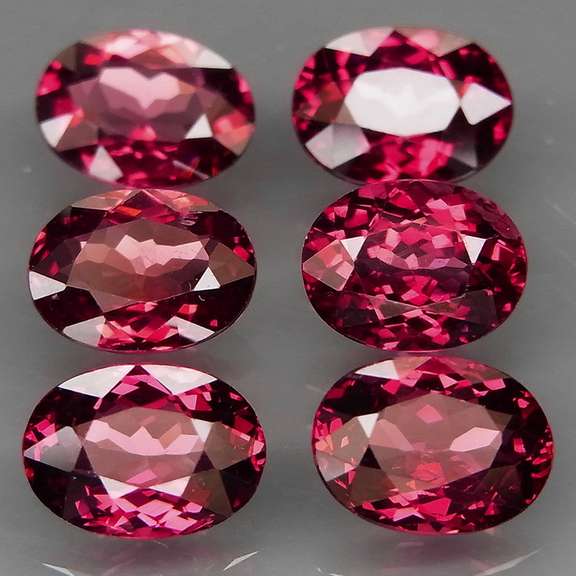Remarkable 9.16ct violet pink Rhodolite Garnet set