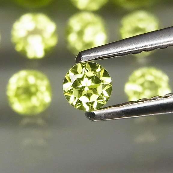 Sparkling 5.38ct untreated apple green Peridot set