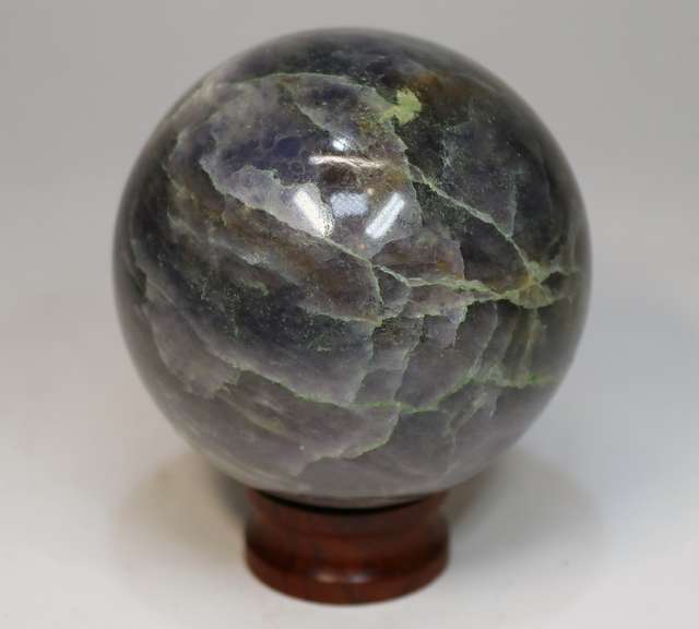 Substantial 1,471ct sphere cut galaxy patterned Iolite