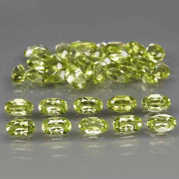 Dazzling 8.75ct untreated lime green Peridot set