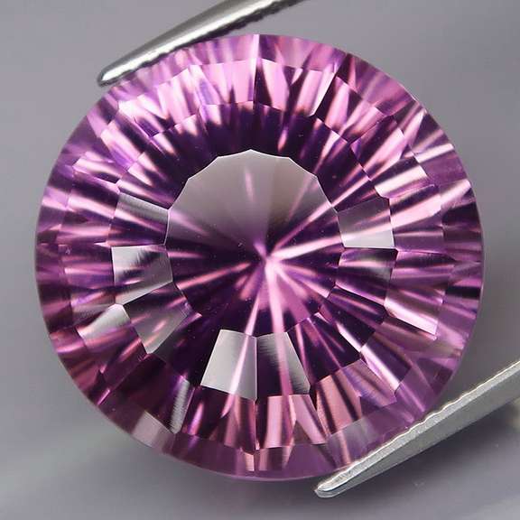 Superb 28.08ct natural concave cut Amethyst