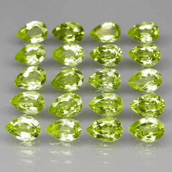 Fantastic 8.87ct 6x4mm pear cut Peridot set