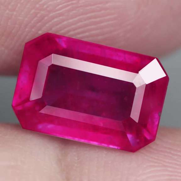 Blood red 3.94ct emerald cut Ruby