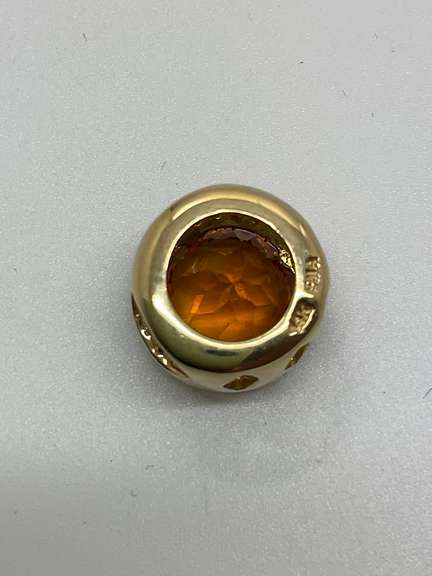 14K GOLD DIAMOND AND TOPAZ PENDANT.