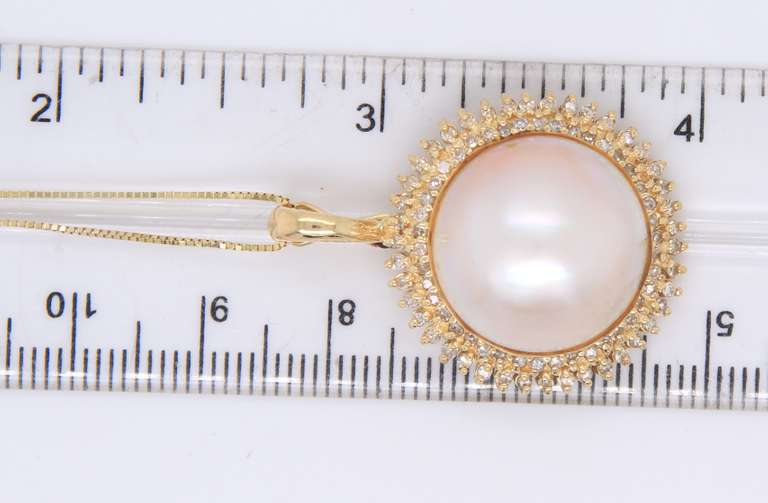 Incredible Yellow Gold Mabe Pearl and Diamond Halo pendant on Chain