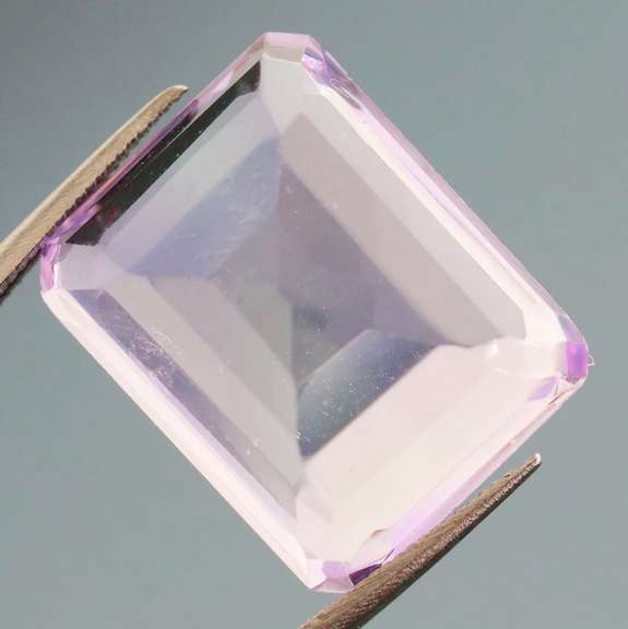 Bright violet 10.39ct emerald cut Amethyst