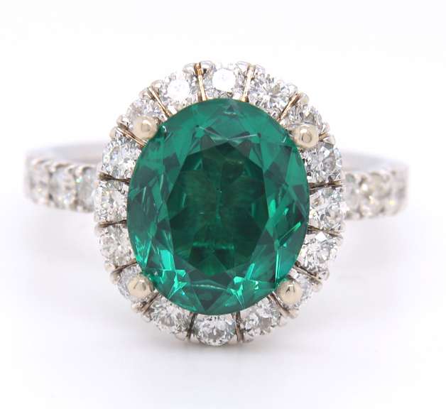 LADIES 14 KT GREEN TOURMALINE and DIAMOND RING.