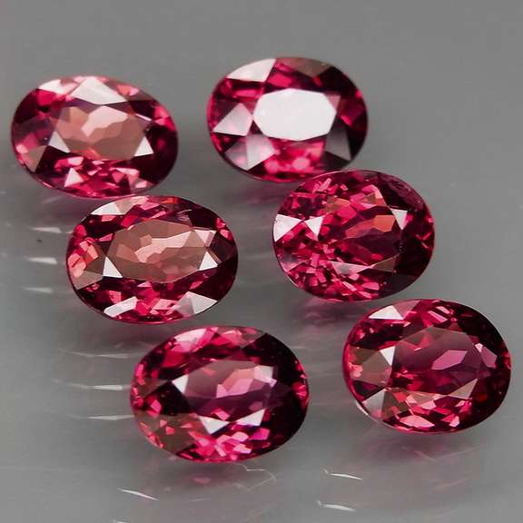 Remarkable 9.16ct violet pink Rhodolite Garnet set