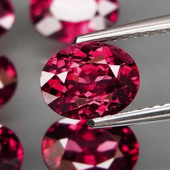 Remarkable 9.16ct violet pink Rhodolite Garnet set