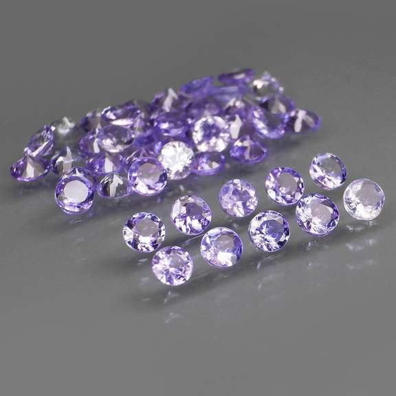 Glittering 4.91ct bright blue violet Tanzanite set