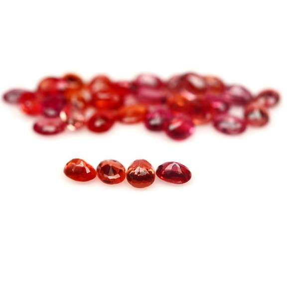 Excellent 7.19ct set of oval cut red Imperial Sapphires