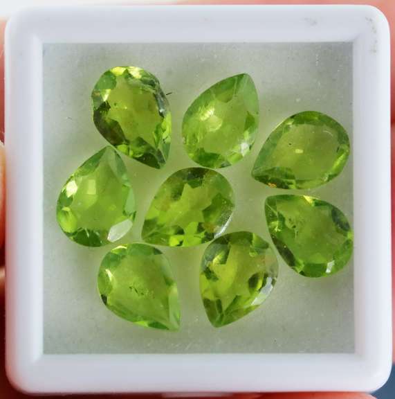 Pear cut 8 piece Peridot set weighing 7.50cts