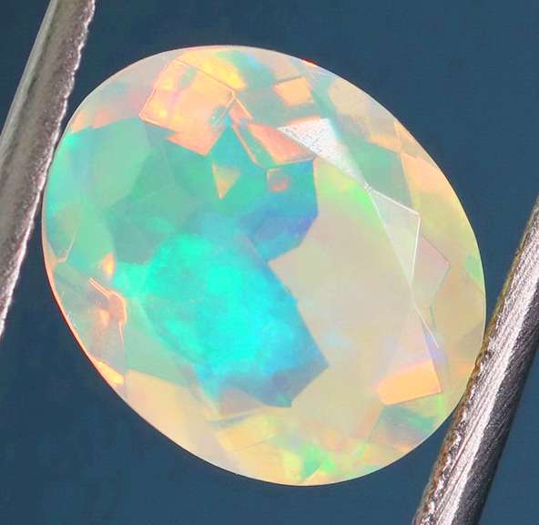 Excellent glittering 1.69ct faceted Jelly Opal