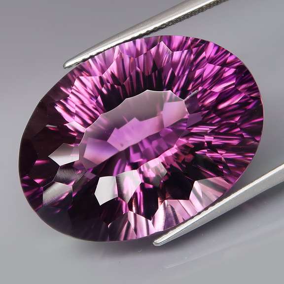 Giant! 42.52ct natural concave cut Amethyst
