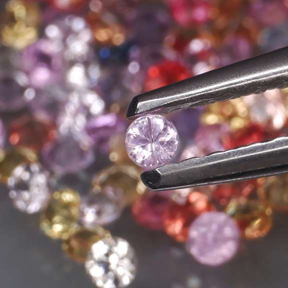 Glittering 4.03ct fancy color Sapphire set