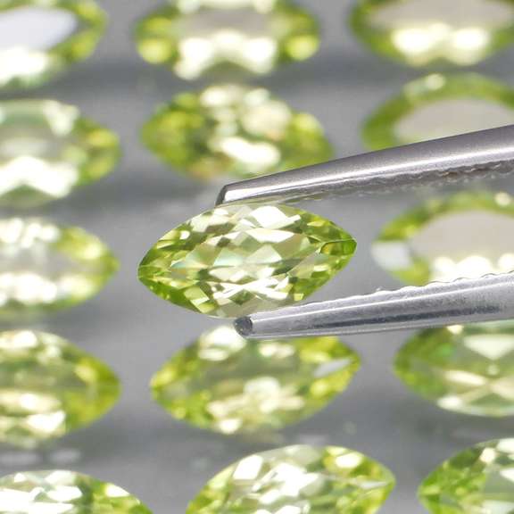 Dazzling 7.85ct untreated apple green Peridot set