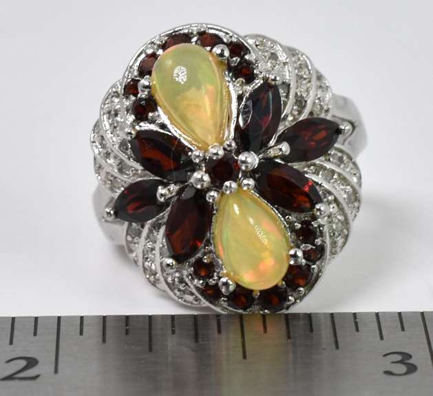 Sterling Silver Ring with Garnet and Opalescent Material