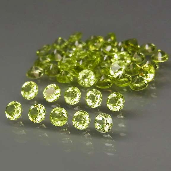 Sparkling 5.38ct untreated apple green Peridot set
