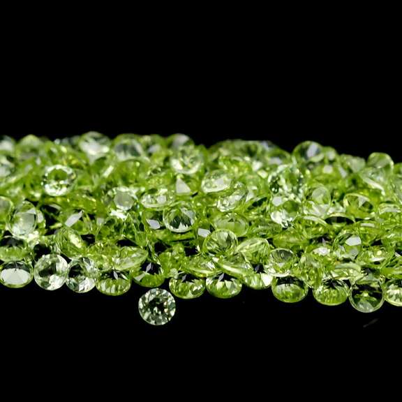 Dazzling 12.38ct untreated apple green Peridot set