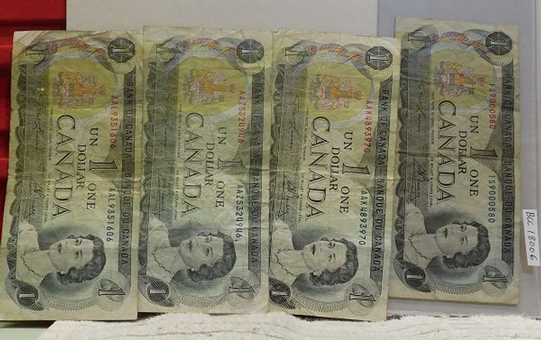4 notes: Canada $1.00 1973 obsolete.