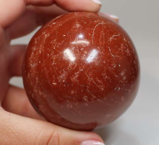 Attention grabbing 1,749ct Red Jasper sphere