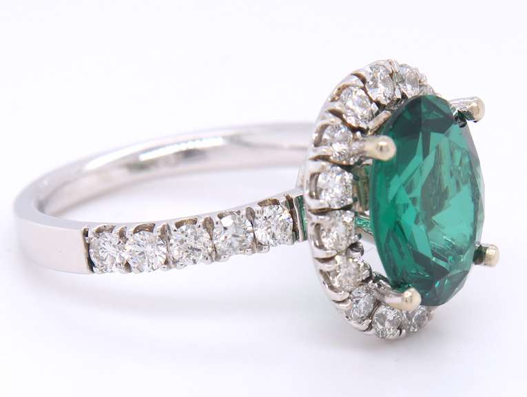 LADIES 14 KT GREEN TOURMALINE and DIAMOND RING.
