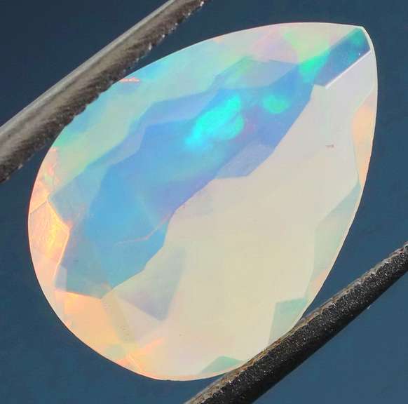 Tremendous glittering 1.69ct faceted Jelly Opal