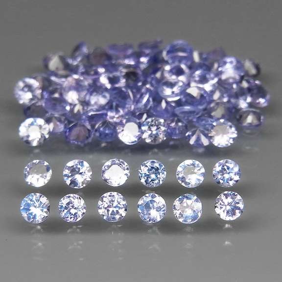 Heavy flashing 6.30ct diamond cut Tanzanite set
