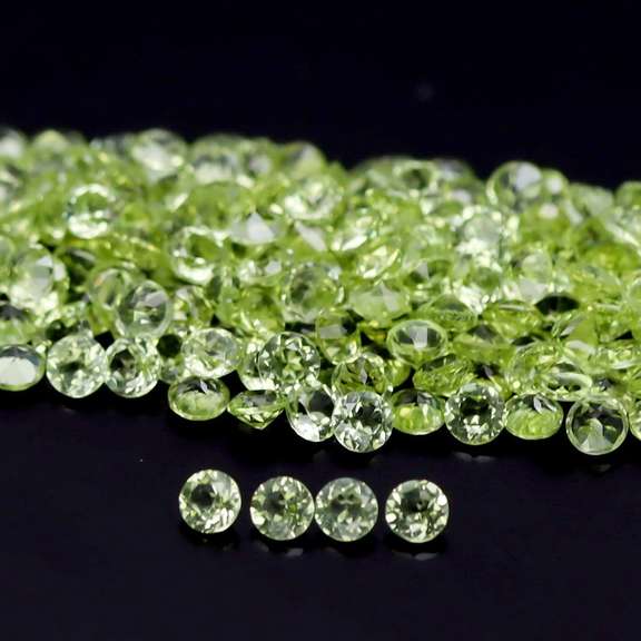 Dazzling 12.38ct untreated apple green Peridot set