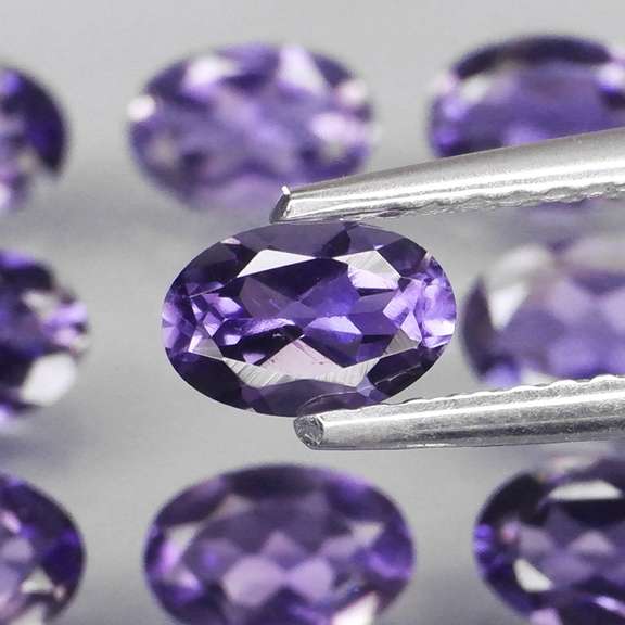 Gorgeous 4.46ct high luster blue violet Iolite set