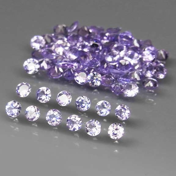 Glittering 5.42ct bright blue violet Tanzanite set