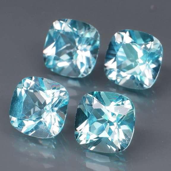 Large 10.08ct vivid blue cushion cut Topaz set