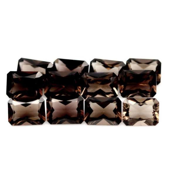 Emerald cut! Unheated! 15.67ct Smoky Quartz set