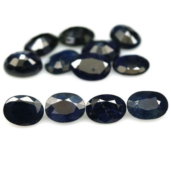 Heated only! 12.46ct dark blue Sapphire set from Madagascar