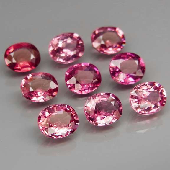Remarkable 6.48ct violet pink Rhodolite Garnet set